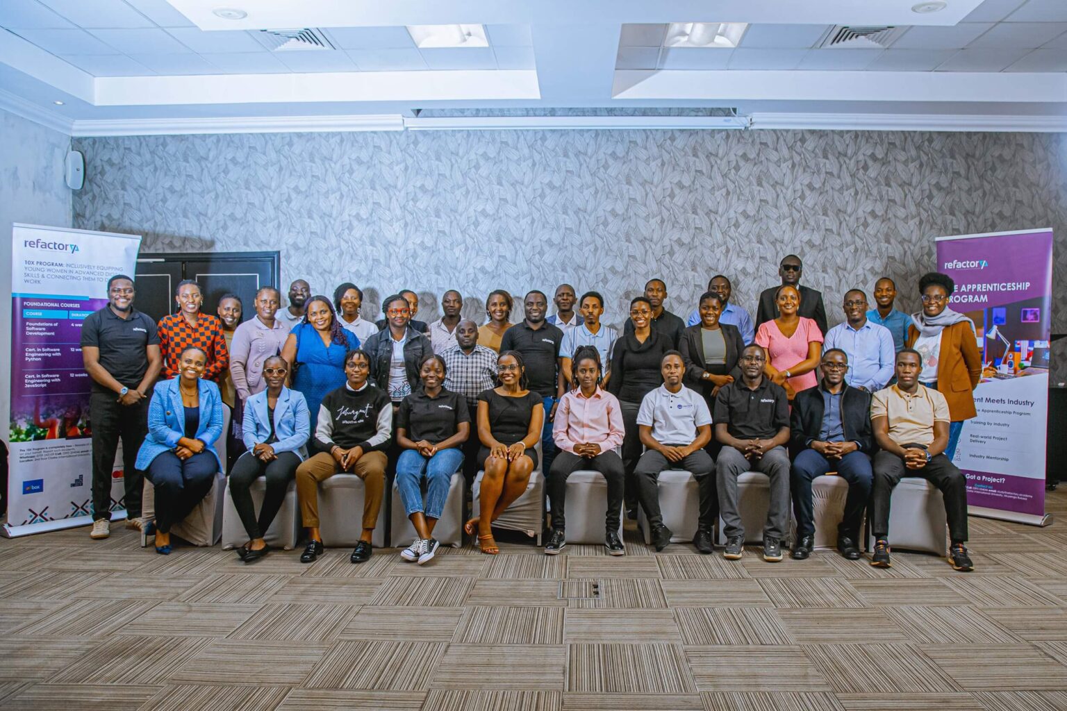 Group of Refactory students collaborating in a professional setting